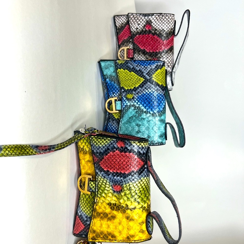 Mini faux snake skin cross body bags